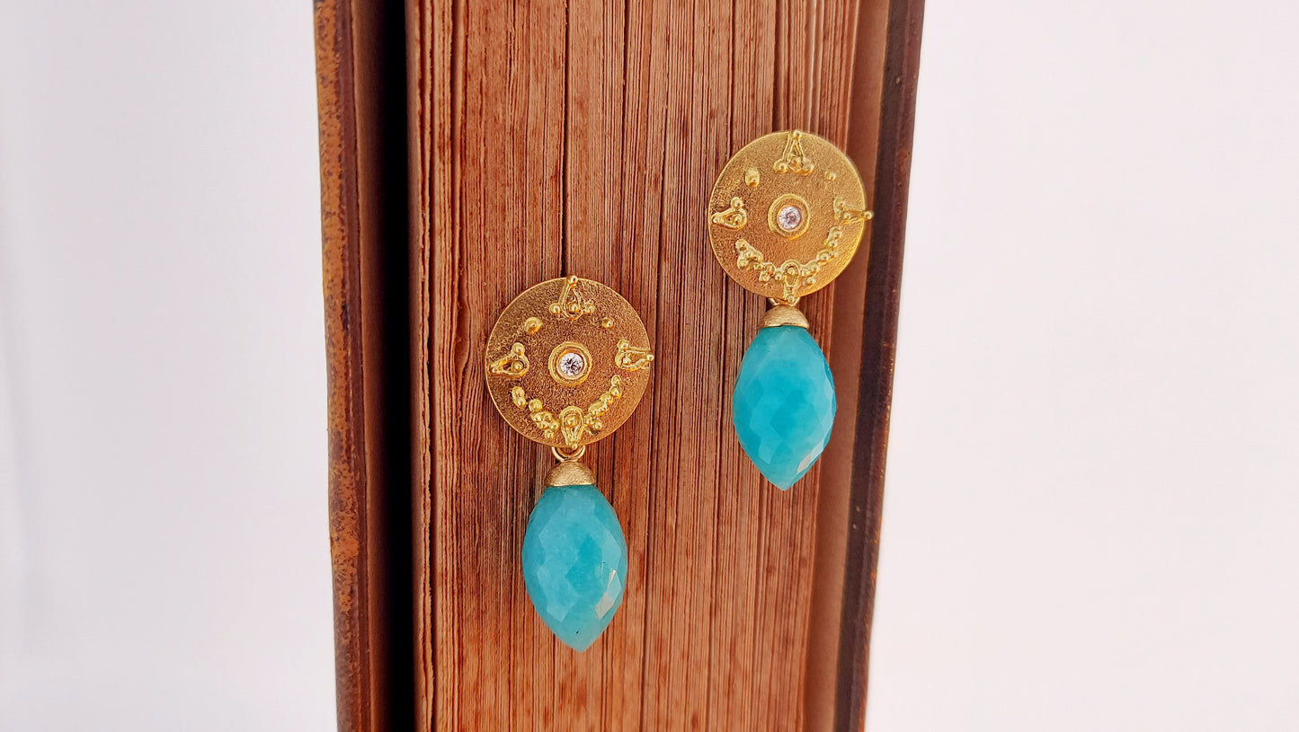 Round stud earrings with diamond and detailing