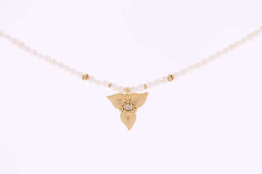 Pearl chain with golden bloom